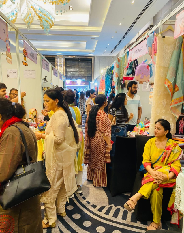 Ladies buying at Fashion & Lifestyle Exhibition stalls for Teej Rakhi in Noida