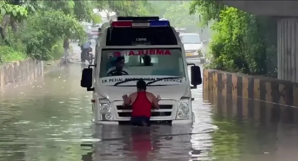 Ambulance stuck under Mahamaya Flyover due to waterlogging in Noida Aug 7-2026